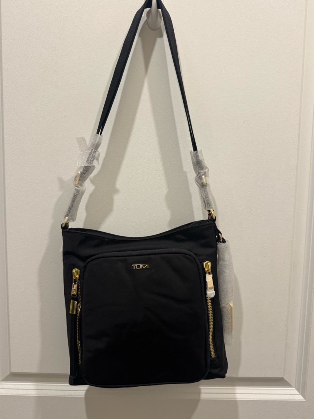 Tumi Black Shoulder Bag with Gold Hardware Accents
